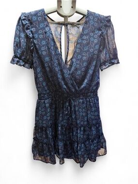 the clothing company Navy Blue Floral Ruffle Wrap Dress